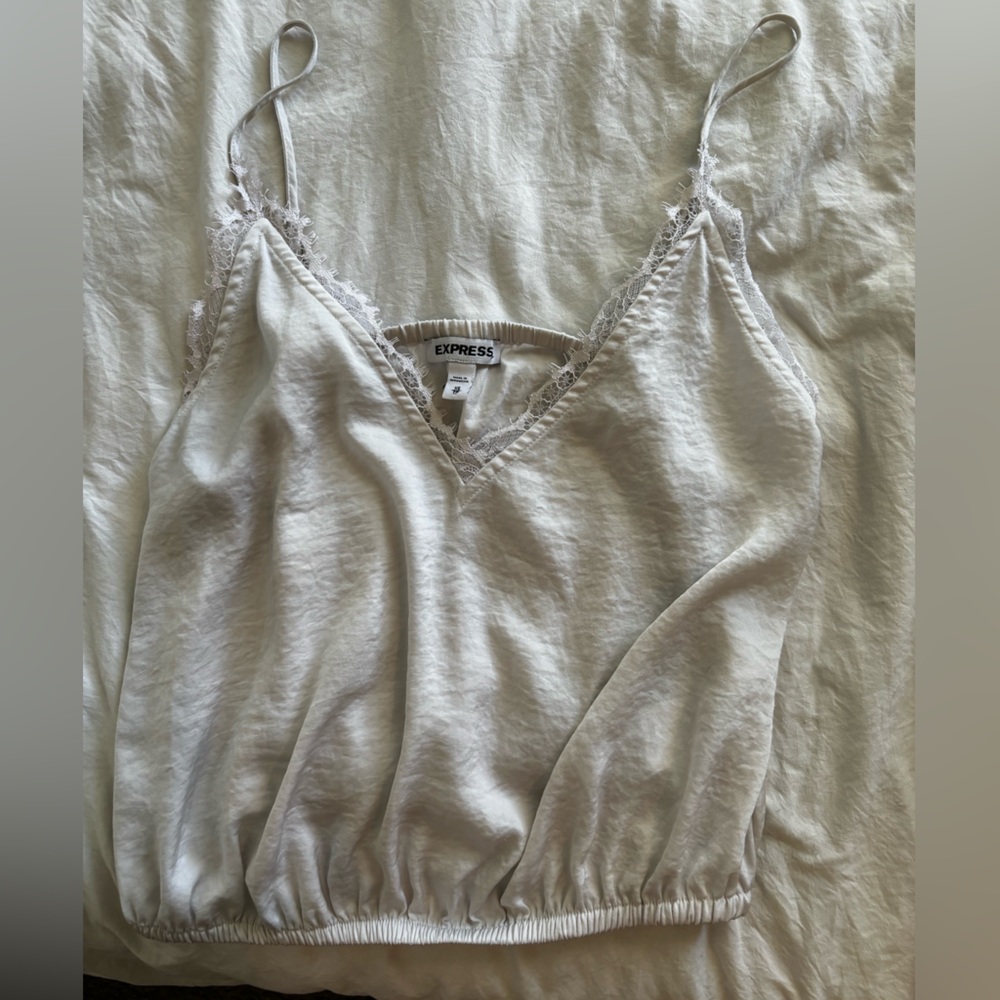 White Express top with lace detail along the neckline